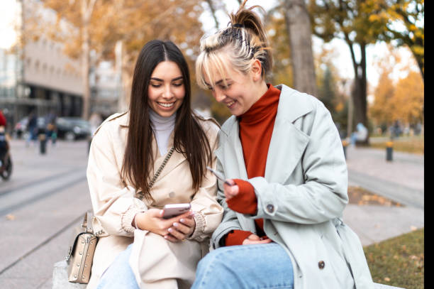 istock Young women having fun while shopping online 2186649854