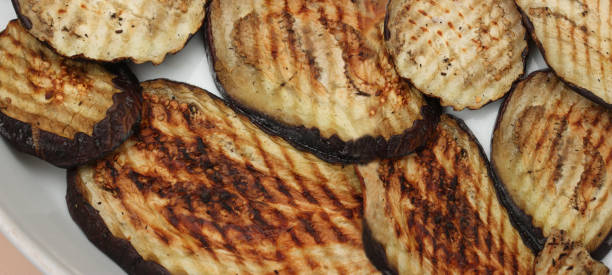 istock Wood-grilled eggplant slices 2186655476