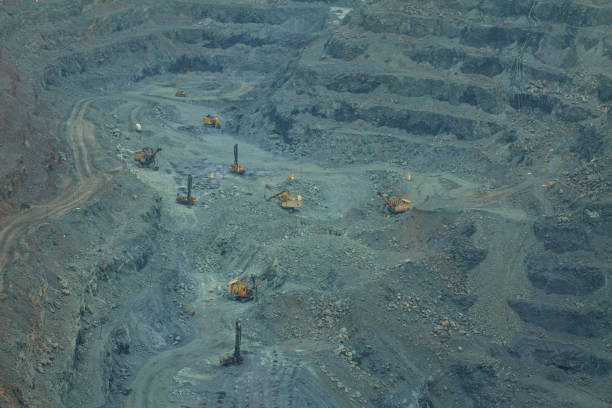 istock The process of open-pit mining in a quarry for the extraction of minerals. 2186664038