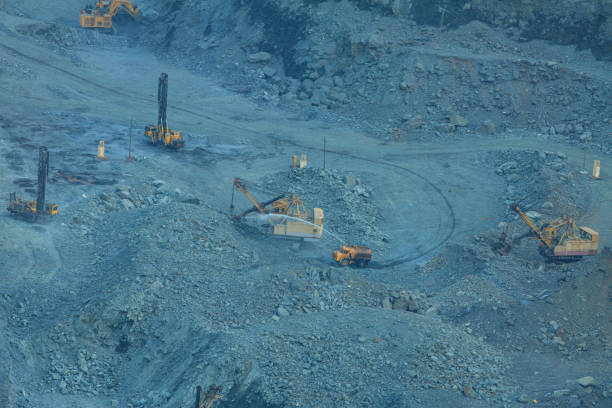 istock The process of open-pit mining in a quarry for the extraction of minerals. 2186664298