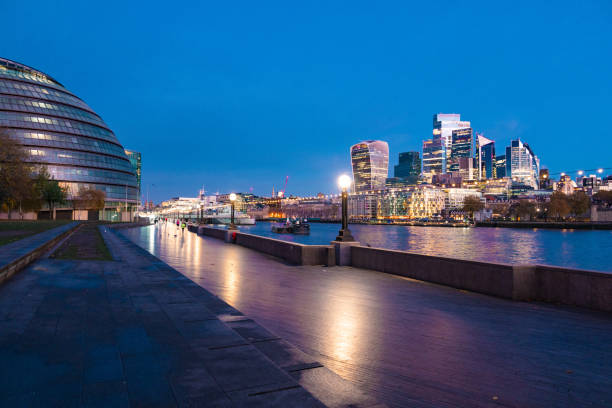 istock London cityscape and river Thames illuminated at evening 2186669717