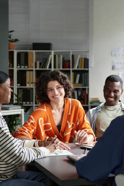 istock Group of Coworkers Collaborating at Office Table 2186672875