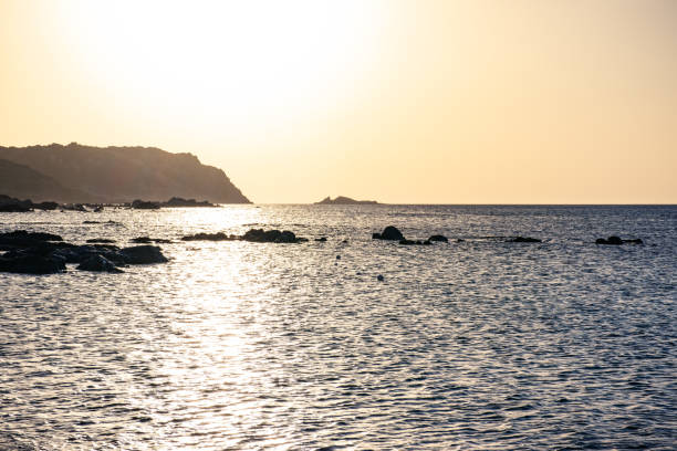 Sunset on mediterranean sea of Gallura coast in northern Sardinia island, Italy