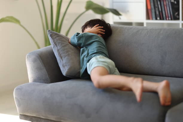 istock Little boy covering his ears with hands 2186673854