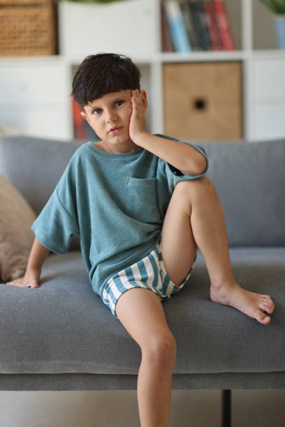istock Lonely sad boy at home 2186674116