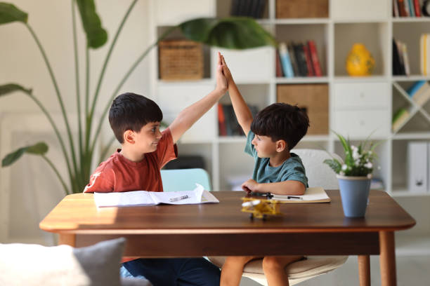 istock Teenager boy studying at home 2186674722