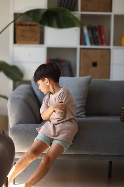 istock Lonely sad boy at home 2186675594