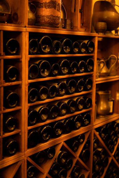 istock photo Explore the Wine Cellar with Classic Bottle Collection and Vintage Storage Solutions for Optimal Organization and Display of Fine Wines in Elegant Wooden Racks 2186679962