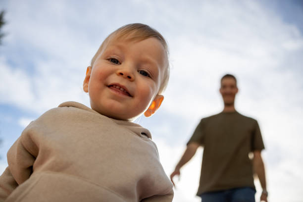 istock Smiling baby boy looking at camera 2186681098