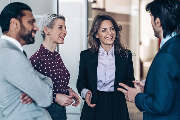 istock Mixed group of business people talking 2186682481
