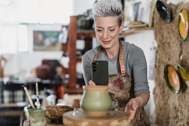 istock Beauty female potter creating social media content 2186682527