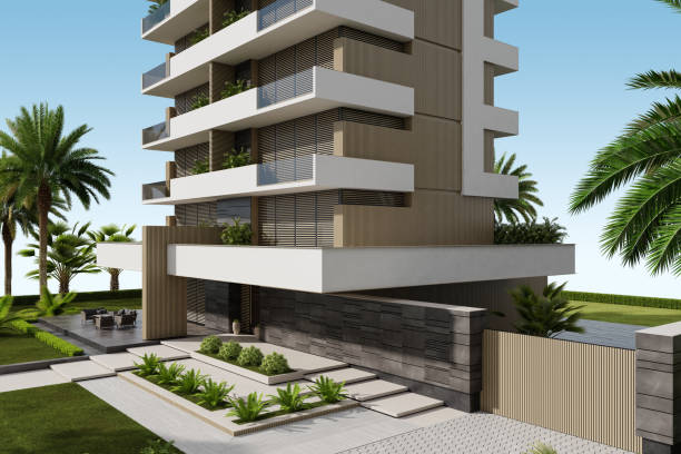 istock Modern Condominium Building with Apartments with Large Windows, Terraces, and Lush Greenery 2186691436