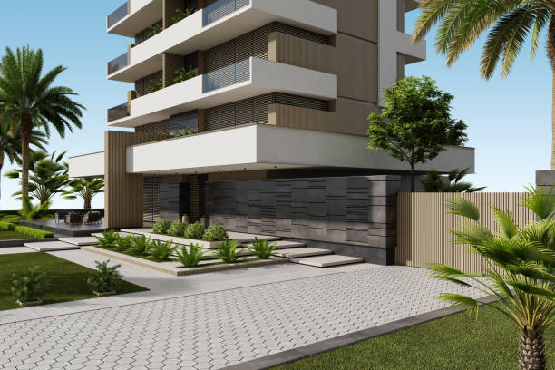 istock Modern Condominium Building with Apartments with Large Windows, Terraces, and Lush Greenery 2186691471