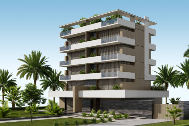 istock Modern Condominium Building with Apartments with Large Windows, Terraces, and Lush Greenery 2186691492
