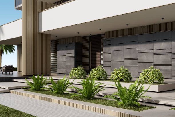 istock Modern Condominium Building with Apartments with Large Windows, Terraces, and Lush Greenery 2186691542