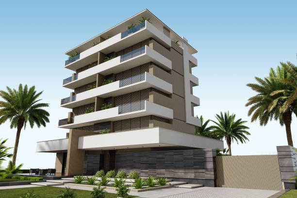 istock Modern Condominium Building with Apartments with Large Windows, Terraces, and Lush Greenery 2186691573