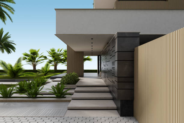 istock Modern Condominium Building with Apartments with Large Windows, Terraces, and Lush Greenery 2186691577