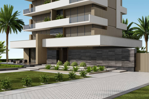istock Modern Condominium Building with Apartments with Large Windows, Terraces, and Lush Greenery 2186692100