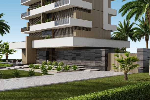 istock Modern Condominium Building with Apartments with Large Windows, Terraces, and Lush Greenery 2186692101