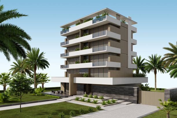 istock Modern Condominium Building with Apartments with Large Windows, Terraces, and Lush Greenery 2186692109