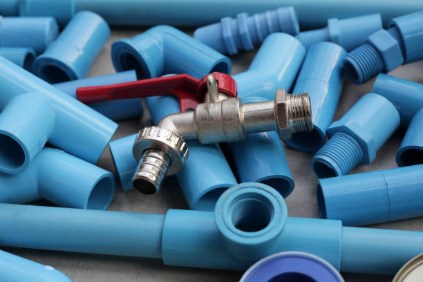 istock Plumber equipment with blue pvc pipe connections for plumbing work. 2186692624