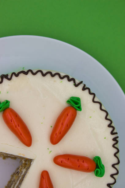 A cropped photo of an unrecognizable Caucasian female  enjoying preparing and arranging holiday sweets.