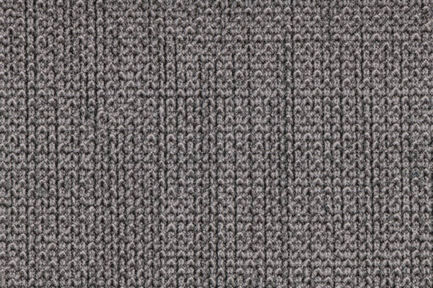 istock Grey knitted fabric with a textured pattern, suitable for upholstery or clothing. 2186696237