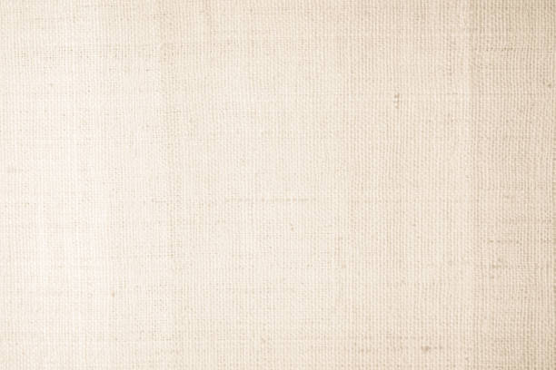 istock Brown sackcloth woven texture background in natural pattern. Jute hessian burlap, linen background in light beige cream color blank. Weaving canvas fiber line cotton cloth textured as organic. 2186699021