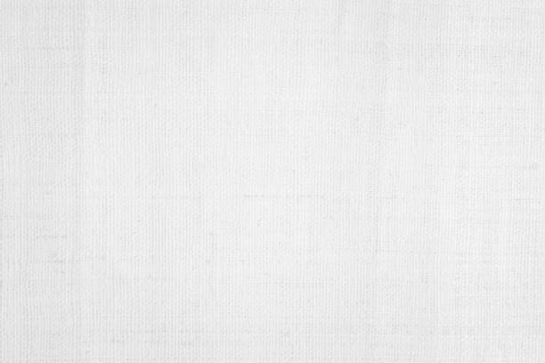 istock White color fabric canvas woven texture background in pattern light blank. Natural gauze linen, carpet wool and cotton cloth textile textured as clean empty for decoration text. Grey sack material. 2186699022