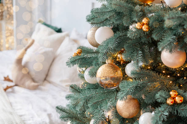 istock Cozy living room adorned with a beautifully decorated Christmas tree 2186699075
