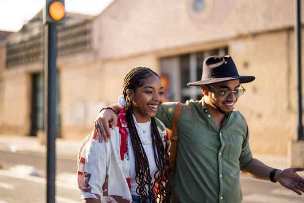 istock Joyful Diverse Couple Strolling in City Light 2186700217