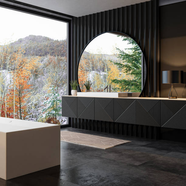 istock Modern Bathroom with Large Circular Mirror, One Sink, and Floor-to-Ceiling Window 2186702248