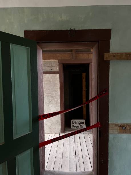 istock abandoned room with danger sign 2186712793