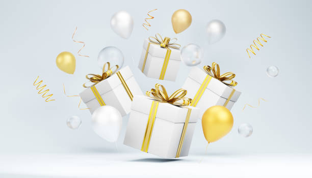istock White gift boxes with gold ribbons floating among balloons and confetti on light blue background 2186713214