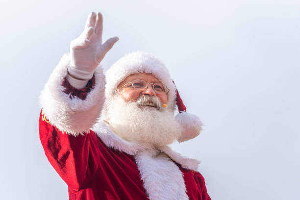 Toronto Ontario, Canada- November 24th, 2024: Santa Claus waving to the crowd during Toronto’s Santa Claus Parade.