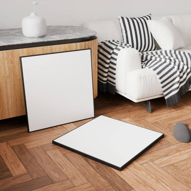 istock mock up, close-up of empty picture frame on floor ,3d render 2186714284