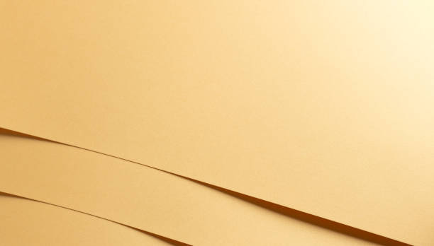 istock Yellow paper background with a smooth texture and subtle pastel tones. Abstract surface with a 2186714314