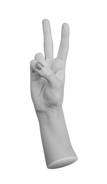 istock Hand making a victory sign with two fingers, isolated on a white background. Gesture symbolizing 2186714315