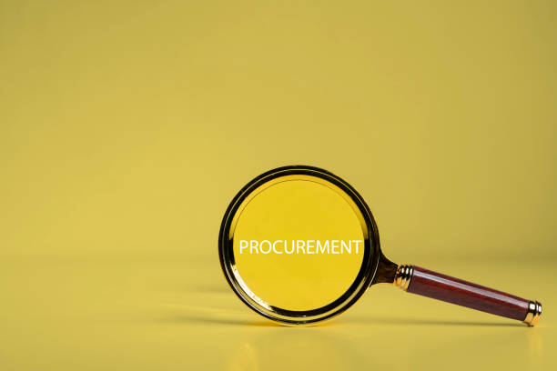 istock Procurement Management Business Concept. PROCUREMENT word through a magnifying glass 2186723273