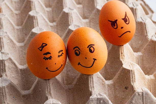 istock A Jealousy stranger egg looking on happy loving egg couple 2186728960