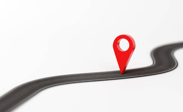 istock Red location pin marking destination on winding road 2186729067