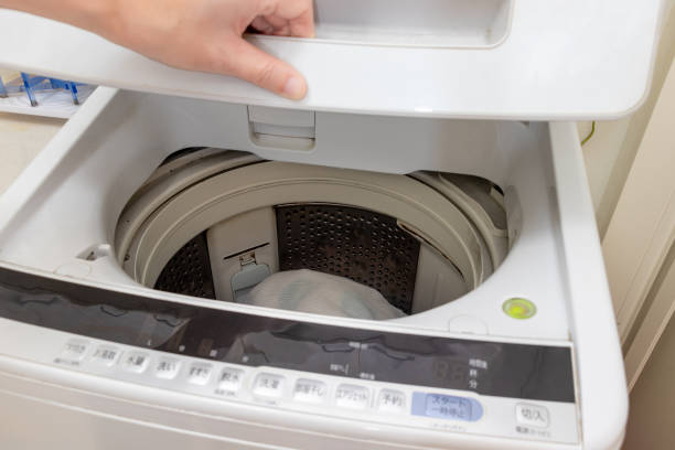 istock Open the lid of the washing machine 2186729497