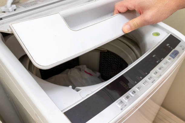 istock Open the lid of the washing machine 2186729498