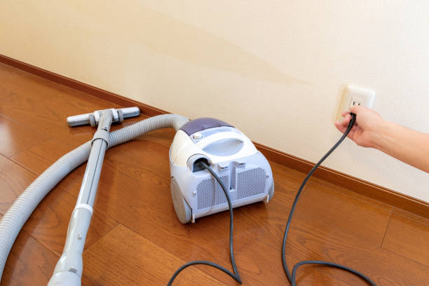 istock Insert the power plug of the vacuum cleaner into the electrical outlet 2186730448