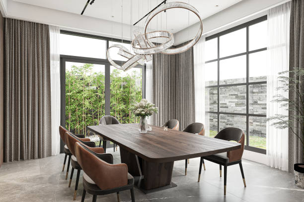 istock Modern Dining Room with Elegant Chandelier and Large Windows 2186732773