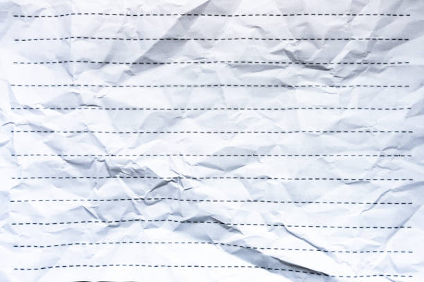White crumpled paper texture with lines and dots for background.