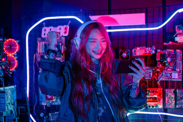 istock Young woman feeling excited at gaming room 2186733781