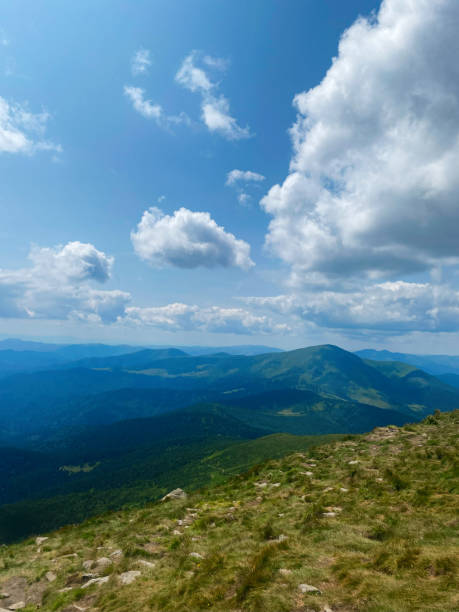 istock Scenic mountain view with expansive blue sky and clouds 2186734816