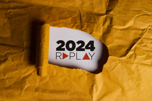 2024 Replay - Torn Yellow Paper with Reflective Text