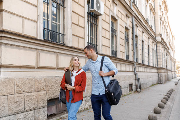 istock Young couple walking in the city 2186739779